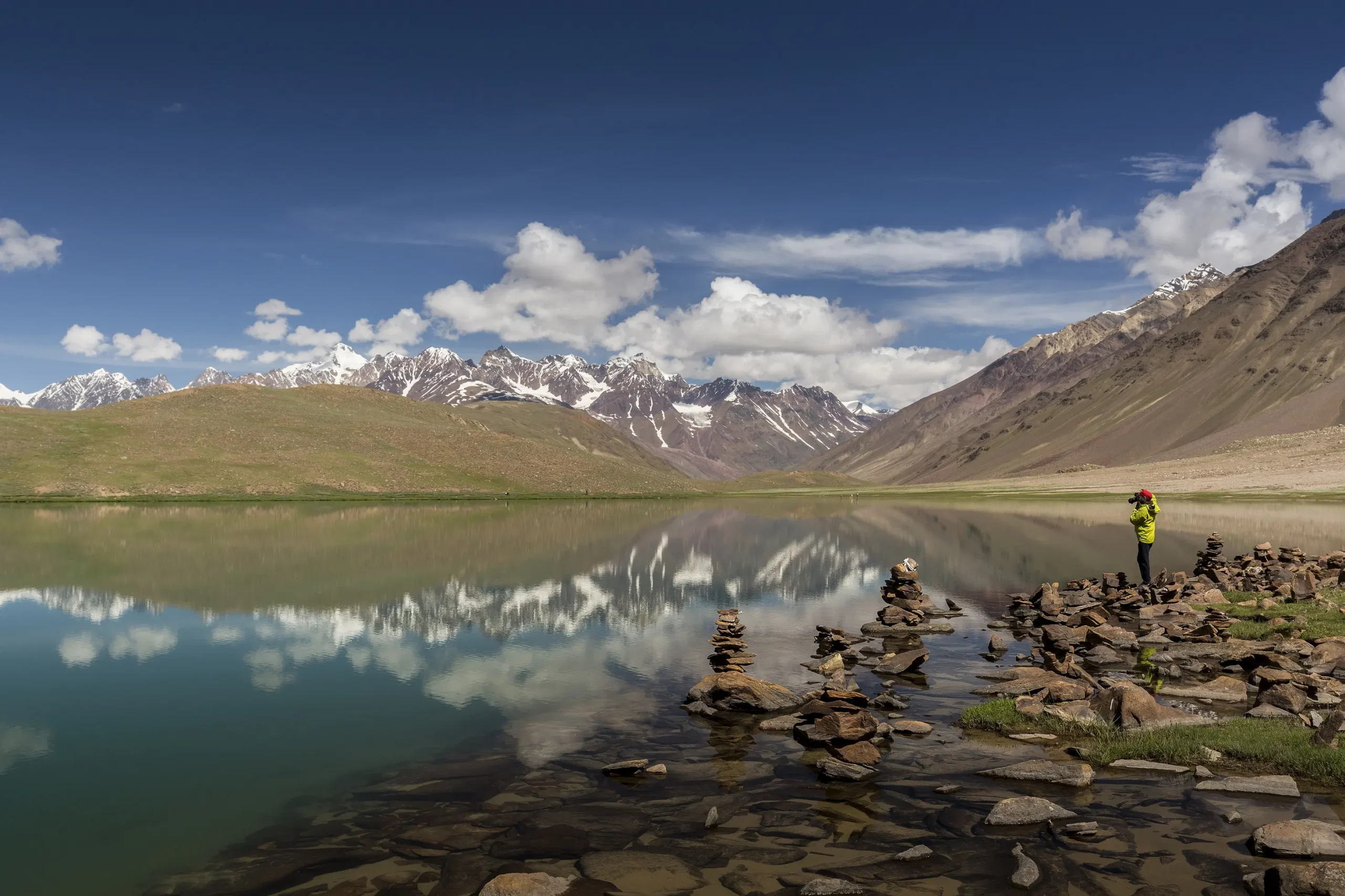 "Road trip in Spiti Valley during summer with clear skies and barren Himalayan mountains"